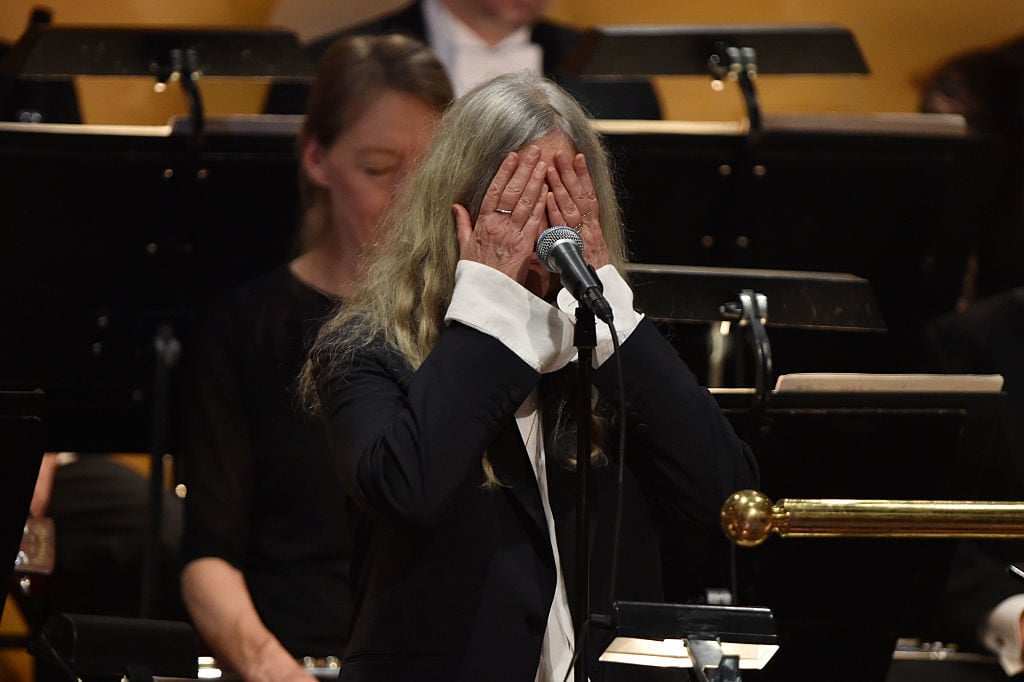 Patti Smith forgets the lyrics on stage as she performs on behalf of Bob Dylan, who didn't want to accept the award in person December 10, 2016 in Stockholm. Image Photo by Pascal Le Segretain/Getty Images