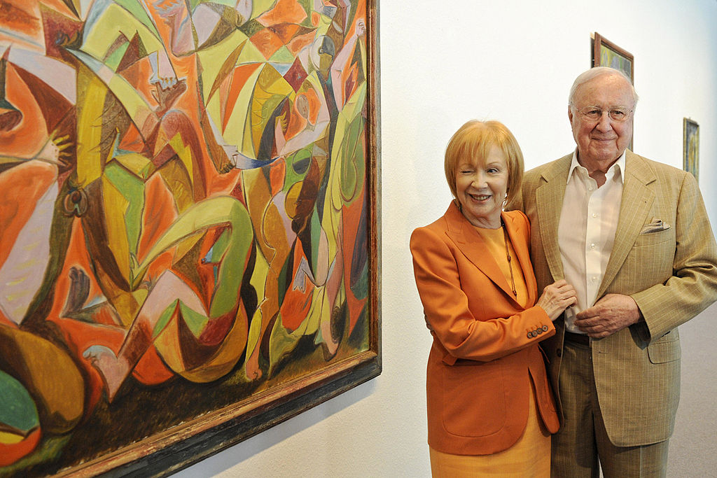 The art collectors Ulla and Heiner Pietzsch in front of Andre Masson's Massacre (1931) in the New National Gallery in Berlin, in 2009, during the presentation of the exhibition "Picture Dreams. Ulla and Heiner Pietzsch Collection". The masterpieces, owned by the couple, are part of the internationally most significant collections of surrealist art. Axel Schmidt/AFP /Getty Images