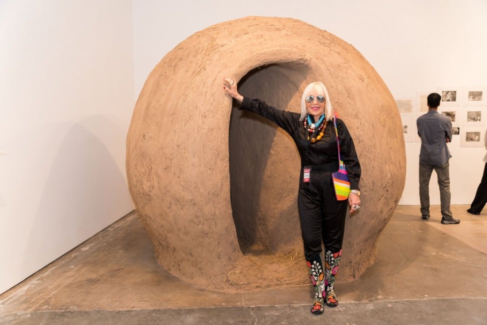 Marta Minujin with her installation in "Much Wider Than a Line." Image courtesy SITE Santa Fe.
