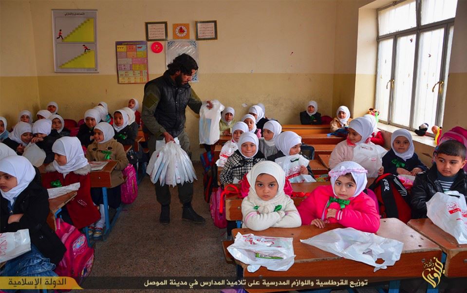 ISIS distributes school supplies to girls in Mosul, Iraq. (2015 video). Image courtesy ICP.