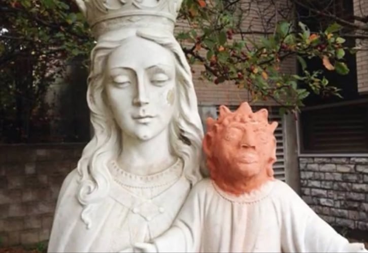 Heather Wise's attempted restoration of a statue of Jesus. Screen grab via YouTube courtesy of Coisas da Net.
