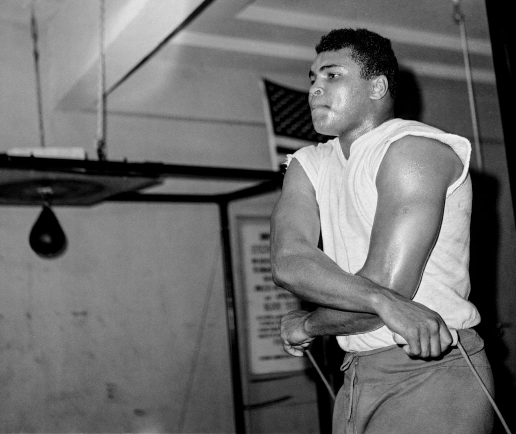 George Kalinsky, Muhammad Ali working out at the 5th St. Gym in Miami (1965). Courtesy George Kalinsky from the first roll of film that shot of his career.