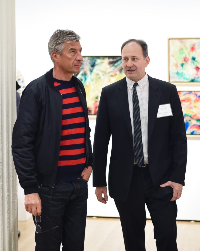 Andrew Edlin and Maurizio Cattelan at the Outsider Art Fair. Courtesy of BFA/Griffin Lipson. 