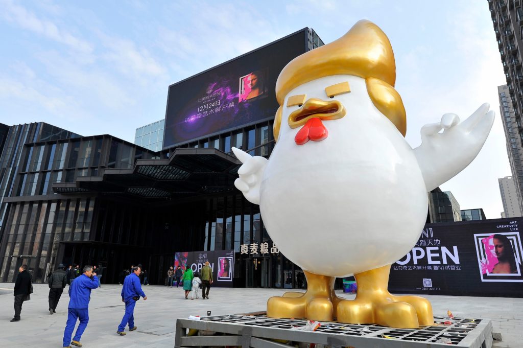 Casey Latiolais's Donald Trump-esque rooster statue for the Chinese New Year. Courtesy of STR/AFP/Getty Images.