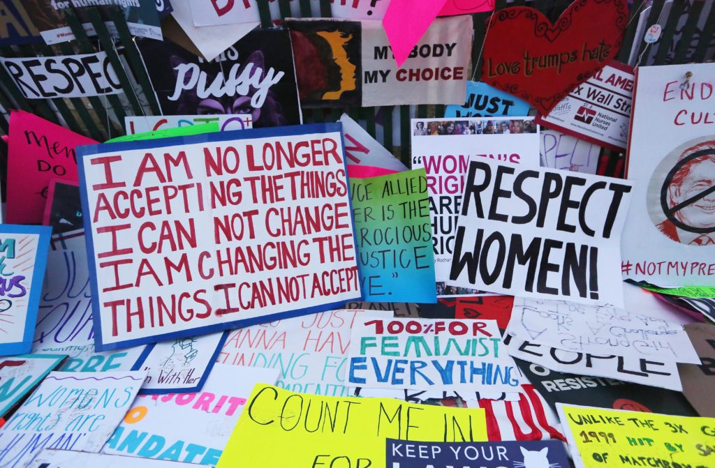 Protester's signs are left near the White House during the Women's March on Washington on January 21, 2017 in Washington, DC. Large crowds are attending the anti-Trump rally a day after US President Donald Trump was sworn in as the 45th U.S. president. Courtesy of Mario Tama/Getty Images.