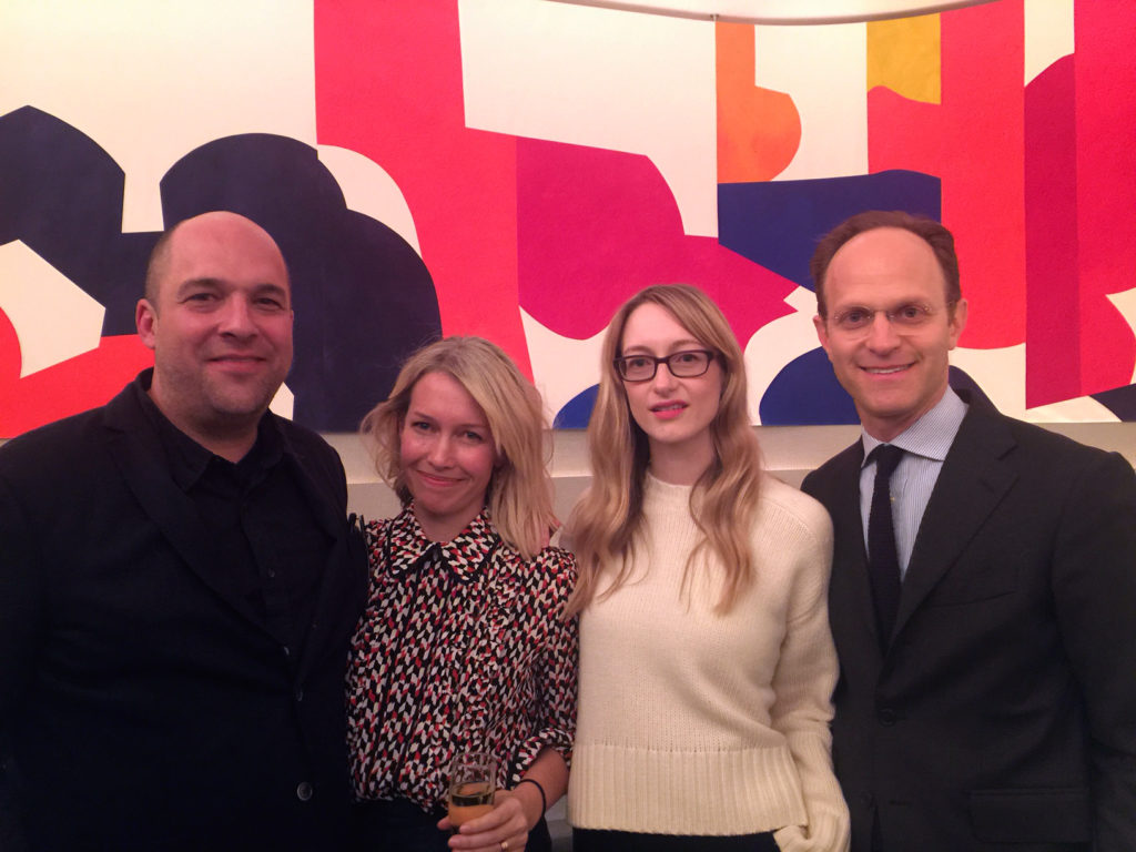 José Noé Suro, Sarah Crowner, Guggenheim curator of contemporary art Katherine Brinson, and Guggenheim deputy director Ari Wiseman, in front of Crowner's <em>Backdrop (after Rodhe, 1961)</em> at the Wright Restaurant at the Guggenheim Museum. Courtesy of Sarah Cascone.