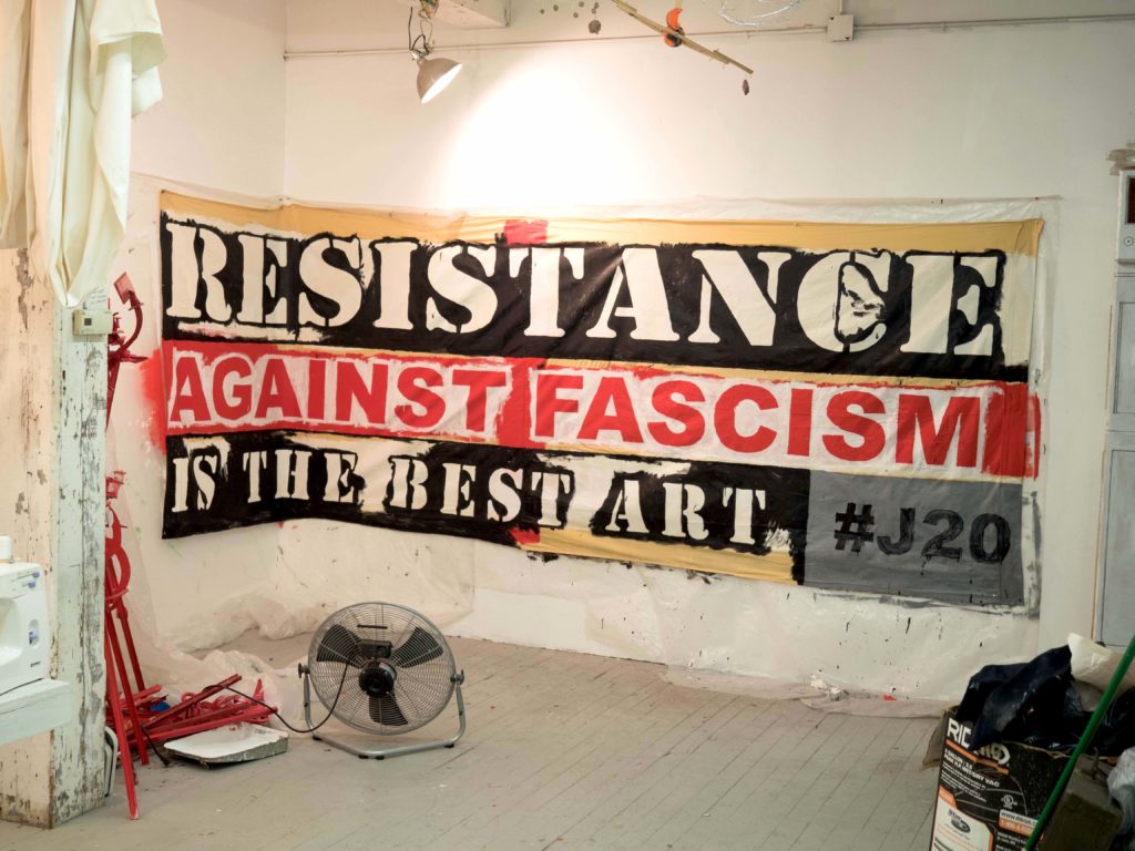 Occupy Museum banner for the J20 