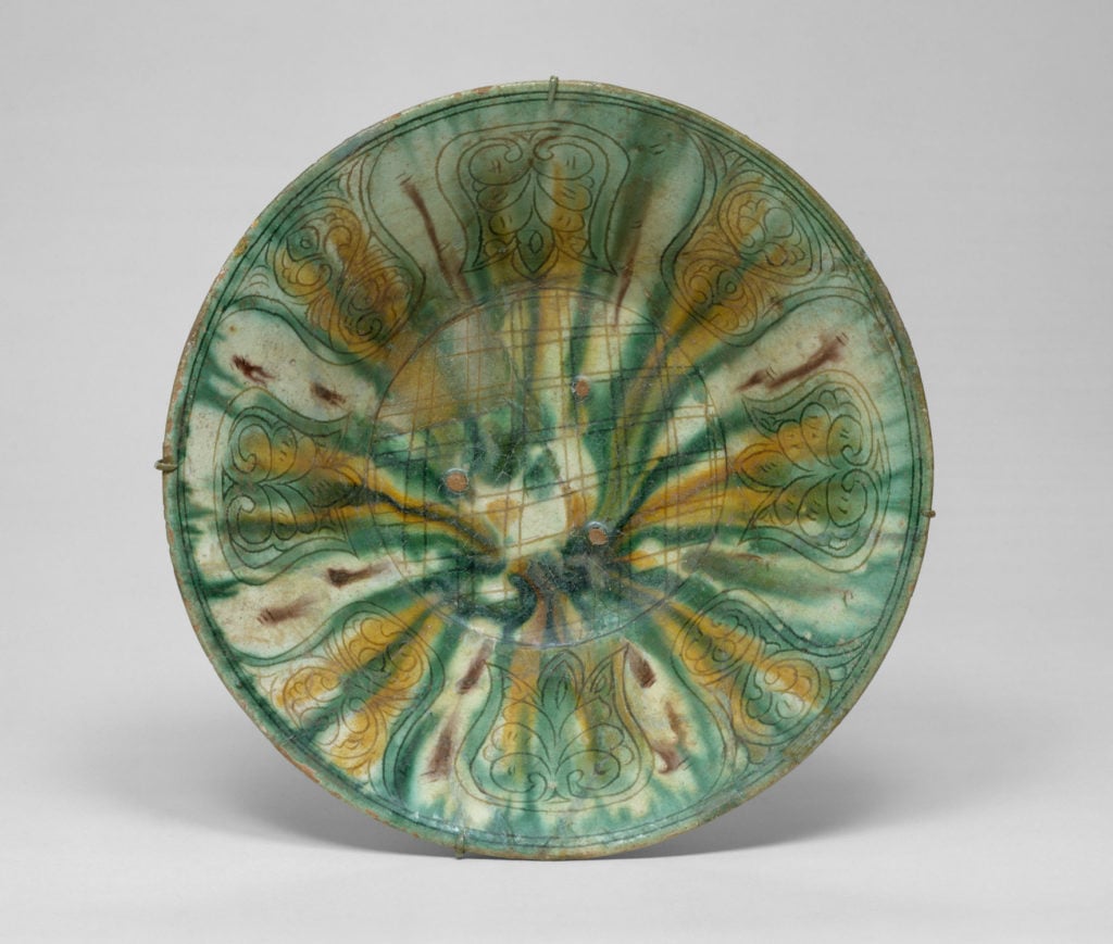 Bowl with Green, Yellow, and Brown Splashed Decoration (10th century), from Nishapur, Iran. Courtesy of the Metropolitan Museum of Art.