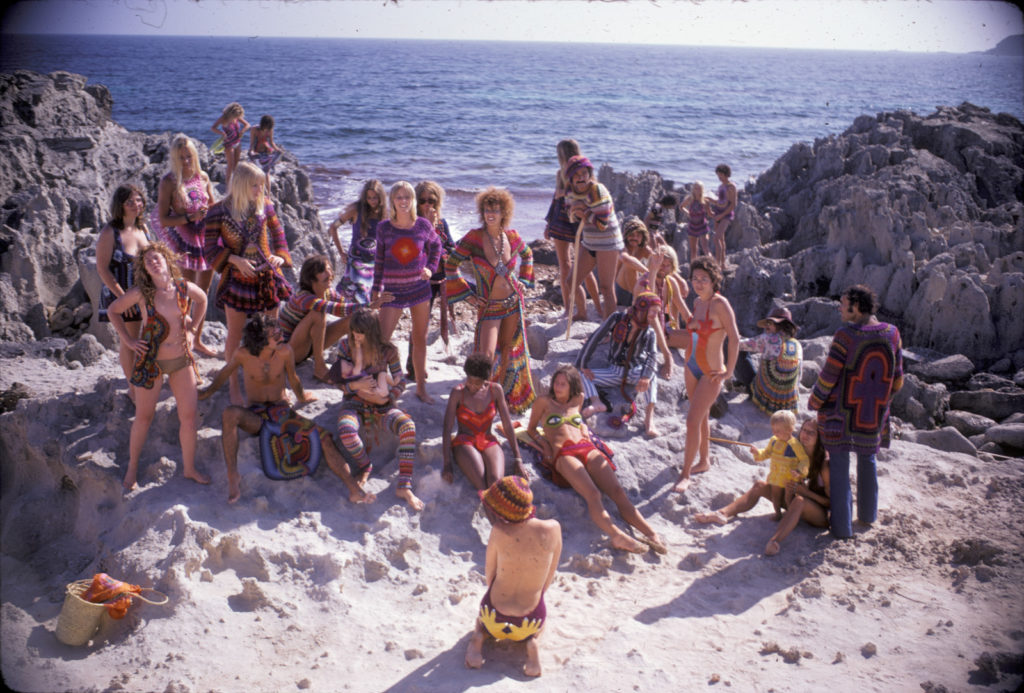 "Hippie Royalty on the Rocks," Ibiza, 1969. Photo by Karl Ferris, featuring crocheted designs by 100% Birgitta. Courtesy of the Museum of Arts and Design. 