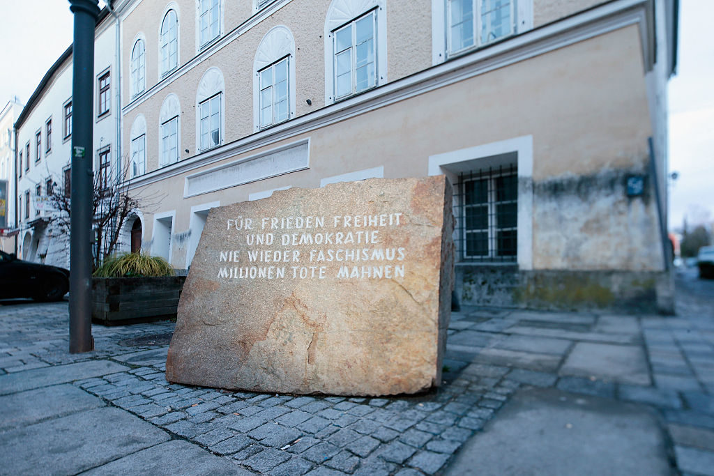 The memorial stone outside Hitler's birth house in Branau am Inn, Austria. Photo courtesy Johannes Simon/Getty Images.