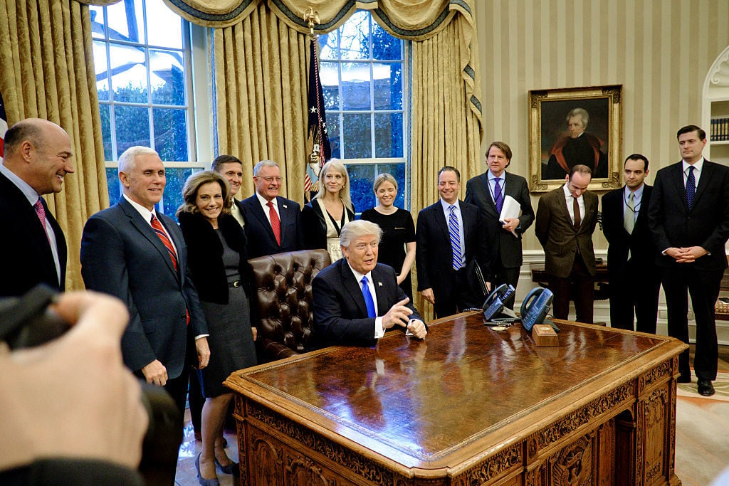 President Donald Trump signs three executive actions in the Oval Office on January 28, 2017, one of them outlining a reorganization of the National Security Council. Photo by Pete Marovich - Pool/Getty Images.