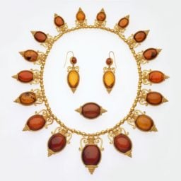 Possibly by Castellani, Necklace, Brooch, and Earrings in the Archaeological Revival Style, Italian (circa 1880), gold and amber. Bequest of William Arnold Buffum. Courtesy of the Museum of Fine Arts Boston.
