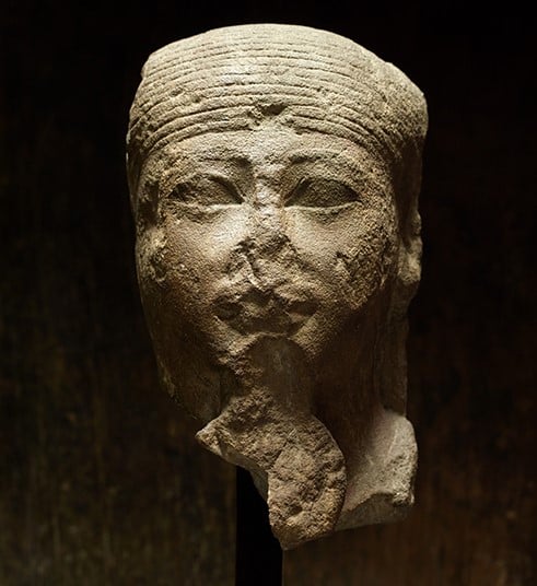 A sandstone head of Senenmut from the New Kingdom, XVIIIth Dynasty, (circa 1479– 1458 B.C.) Courtesy Axel Vervoordt.