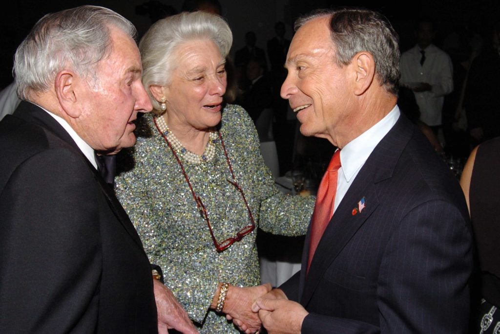 David Rockefeller, Happy Rockefeller, and Mayor Michael Bloomberg at the Museum of Modern Art's 37th Annual Party in the Garden, celebrating David Rockefeller's 90th birthday in 2005. Courtesy of Billy Farrell, ©Patrick McMullan.
