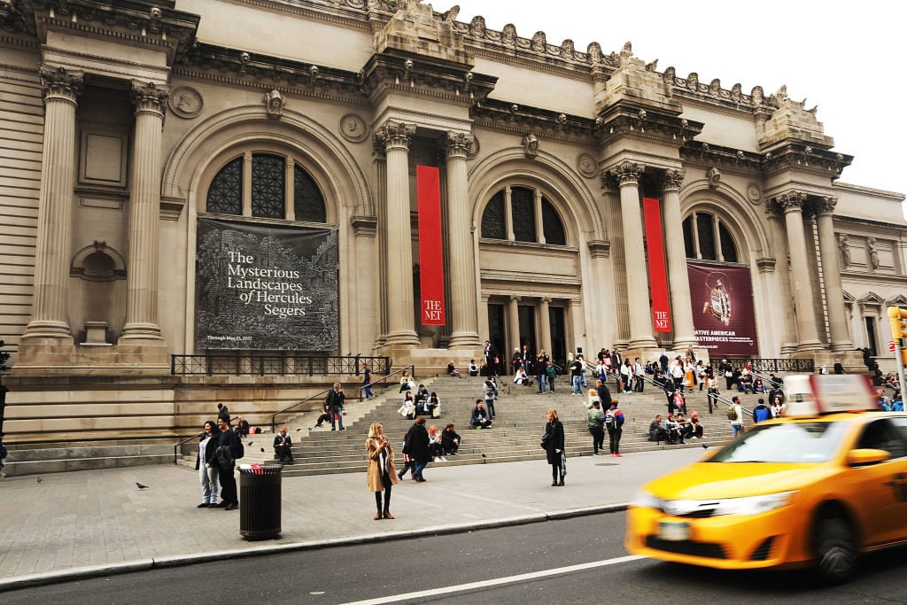 People congregate at the entrance to the Metropolitan Museum of Art. Photo by Spencer Platt/Getty Images.