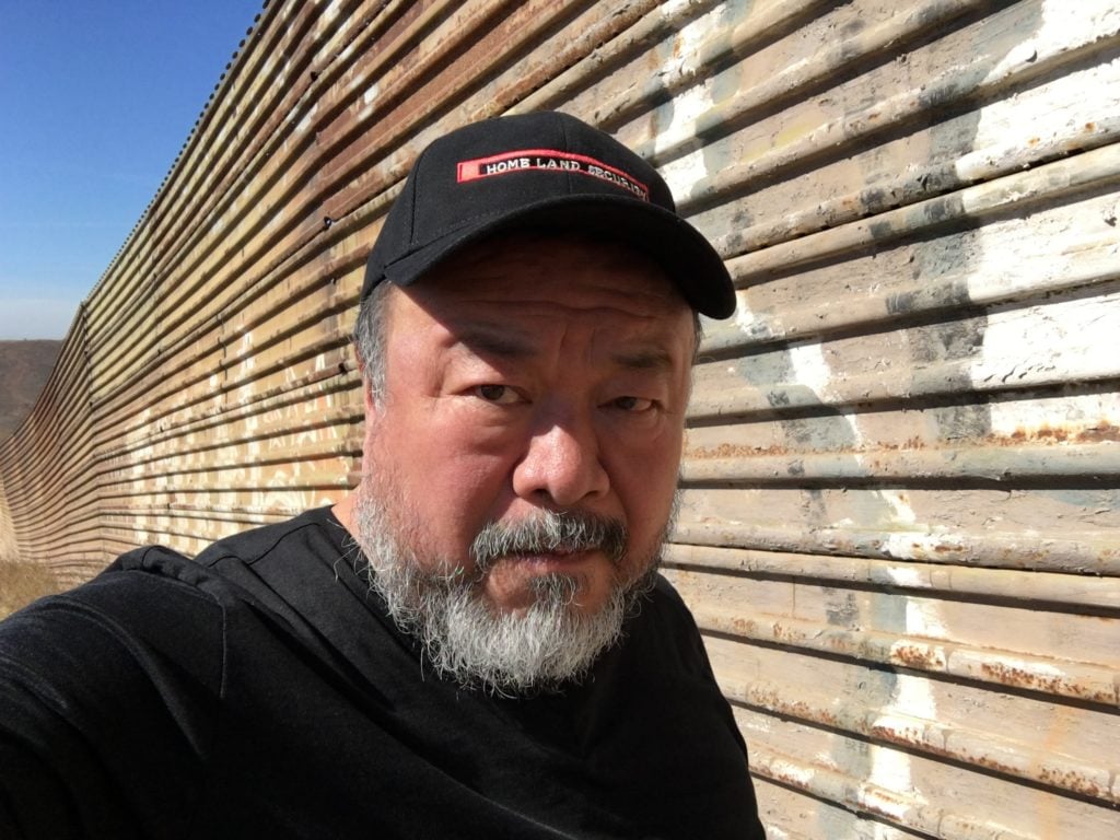 Ai Weiwei at the U S/Mexico border, Tijuana, 2016. Image courtesy of Ai Weiwei Studio.