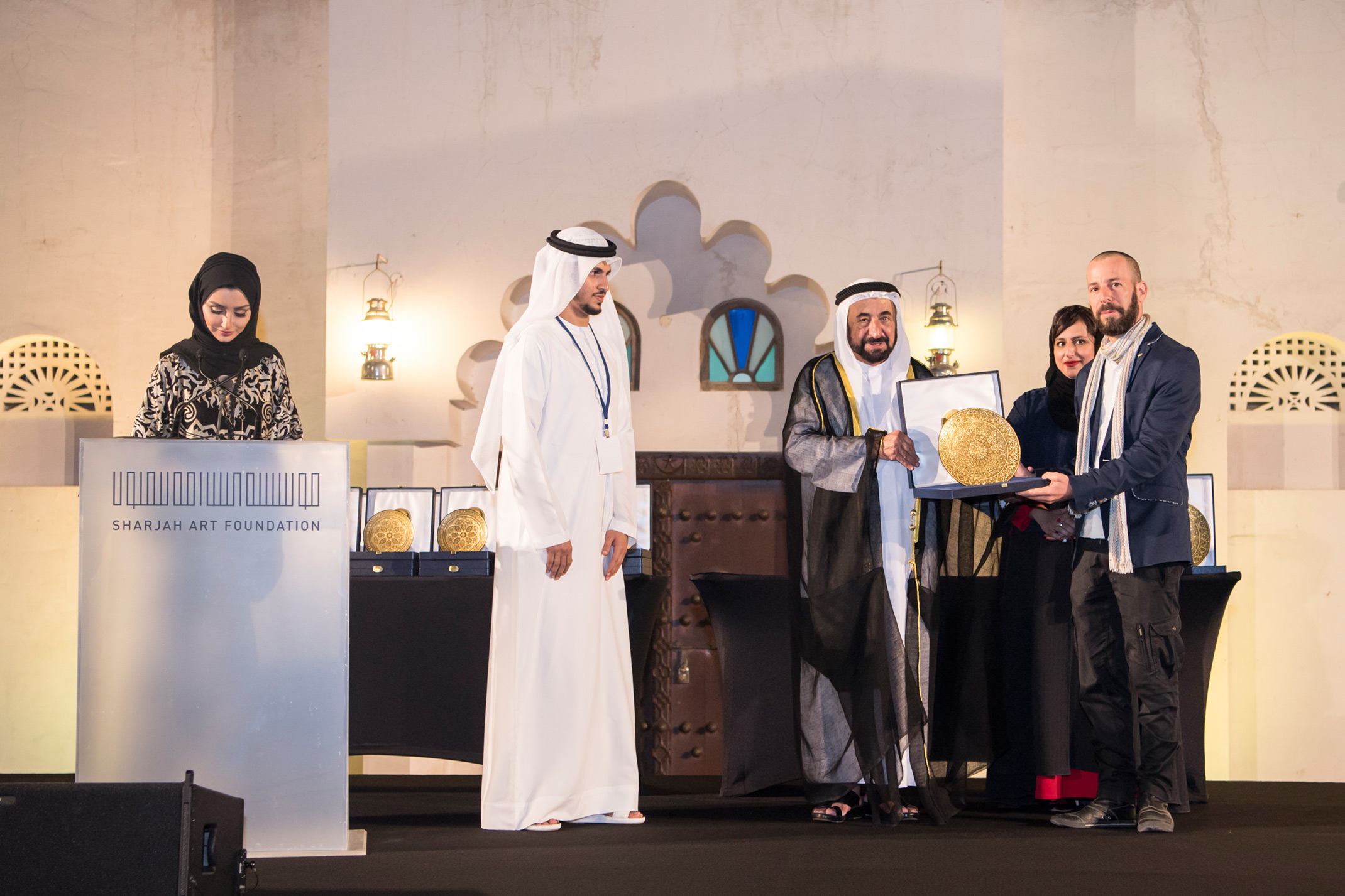 Uriel Orlow receiving his award. Courtesy the Sharjah Art Foundation