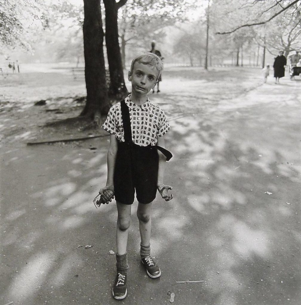 Diane Arbus, Child With Toy Hand Grenade, Central Park, NYC, 1962 (printed 1972). Courtesy of artnet Auctions.