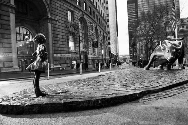 Kristen Visbal's <em>The Fearless Girl</em> statue on Wall Street. Courtesy of State Street. 