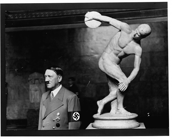 Hitler with a Statue of a Discus Thrower. Photo by Library of Congress/Corbis/VCG via Getty Images.