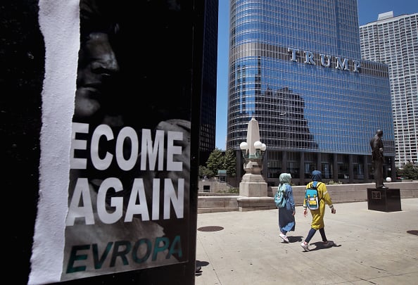 A defaced recruiting flyer for Identity Evropa hangs near Trump Tower on July 6, 2016 in Chicago, Illinois. Photo by Scott Olson/Getty Images.