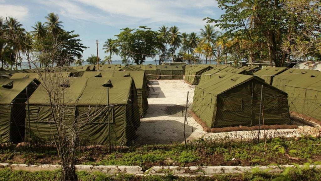 In this handout photo provided by the Australian Department of Immigration and Citizenship, facilities at the Manus Island Regional Processing Facility, used for the detention of asylum seekers that arrive by boat, are seen on Manus Island, Papua New Guinea in 2012. Photo courtesy of the Australian Department of Immigration and Citizenship via Getty Images.