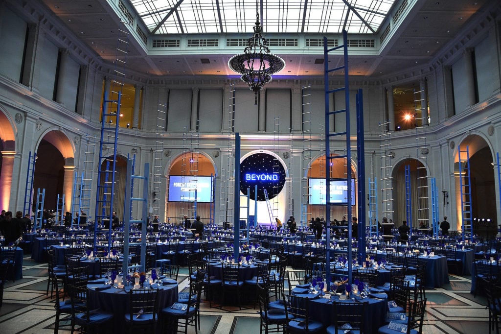 The dining room designed by David Stark, according to the "Infinite Blue" theme. Photo by Kevin Mazur/Getty Images for Brooklyn Museum.