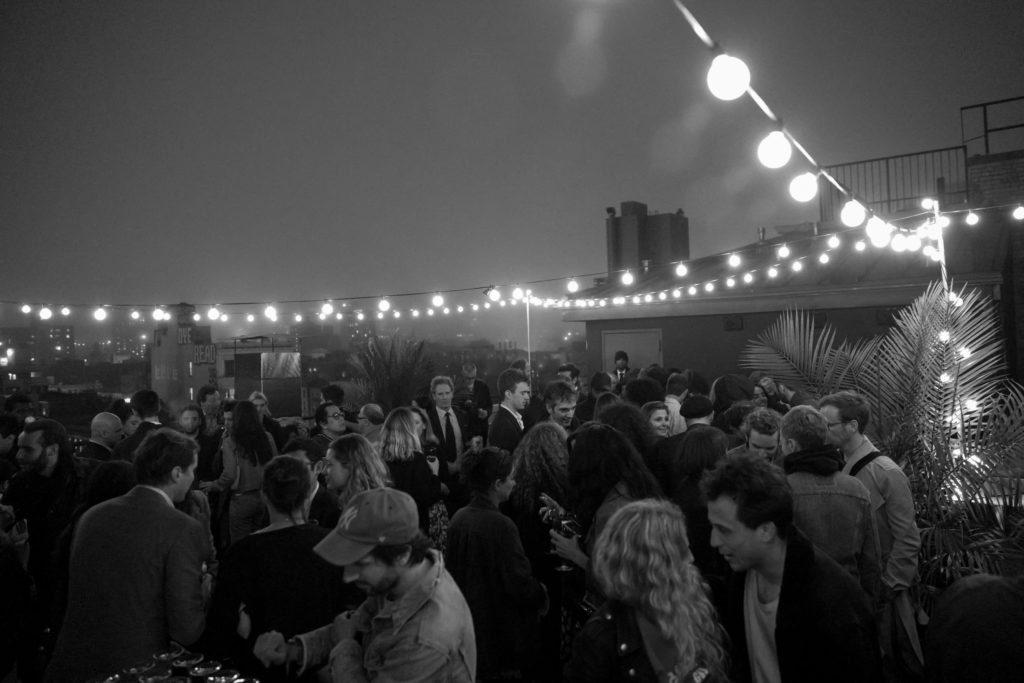 Guests on the roof at the opening of the new Galerie Perrotin on the Lower East Side. Courtesy BFA.