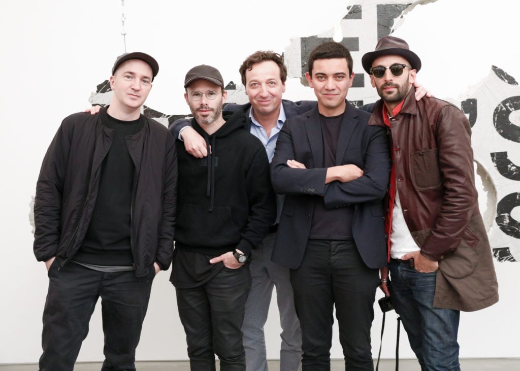 Brian Donnely, Daniel Arsham, Emmanuel Perrotin, Ivan Argote, and JR at the opening of the new Galerie Perrotin on the Lower East Side. Courtesy BFA.