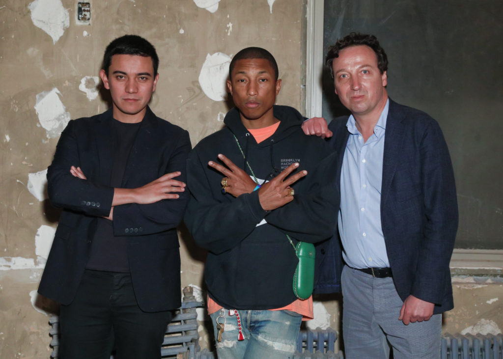 Ivan Argote, Pharrell Williams, and Emmanuel Perrotin at the opening of the new Galerie Perrotin on the Lower East Side. Courtesy BFA.