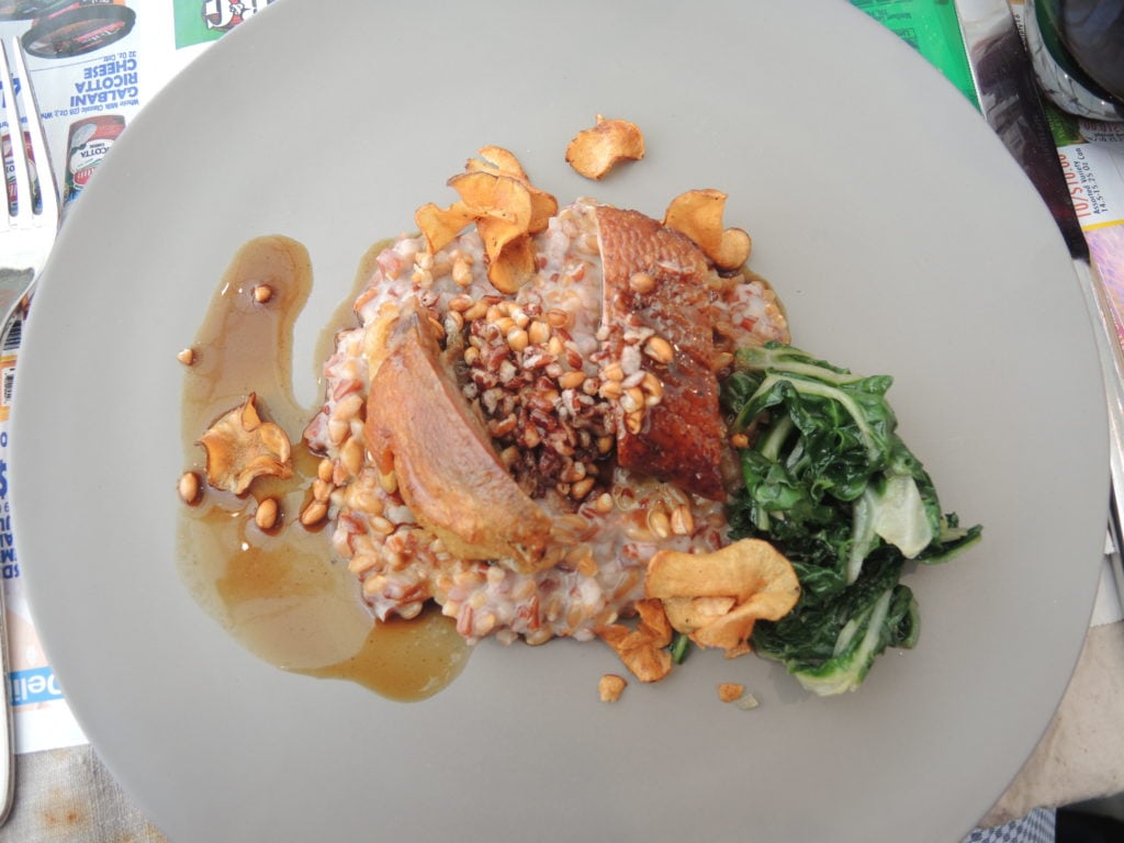 Susan Cianciolo, Run Restaurant Untitled, served duck confit with ancient grains. Courtesy of Sarah Cascone.