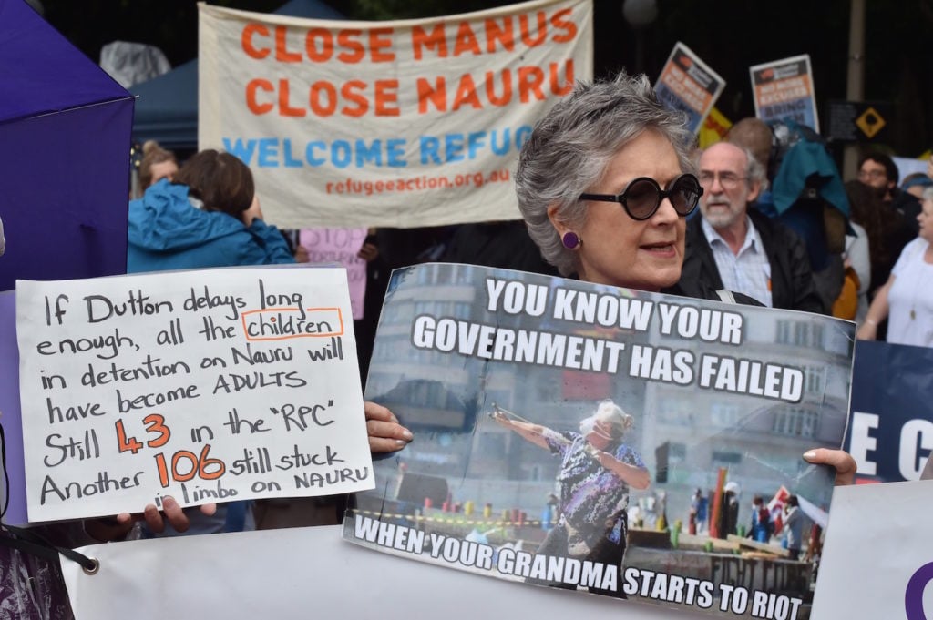 Protesters hold a rally in Sydney to urge the Australian government to end the refugee crisis on Manus Island on November 4, 2017. Photo courtesy of Peter Parks/AFP/Getty Images.
