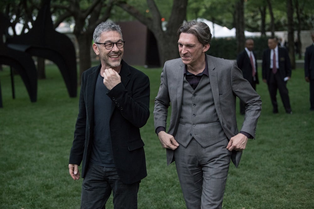 Pierre Huyghe strolling the Sculpture Center with curator Nicolas Bourriaud. Photo courtesy of Bruno.