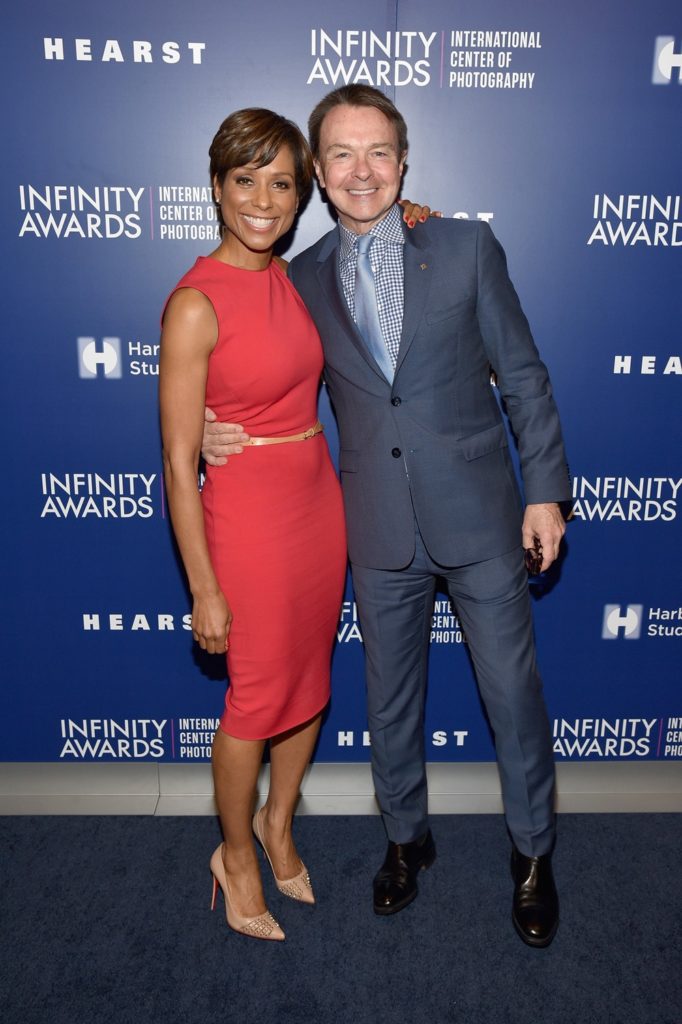 News anchor Sade Baderinwa (L) Publishing director, Hearst Magazines Michael A. Clinton attend The International Center of Photography's 33rd Annual Infinity Awards (Photo by Bryan Bedder/Getty Images for ICP)