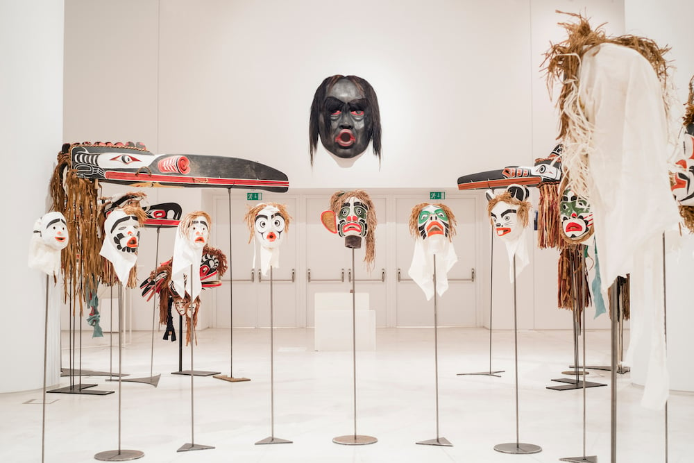 Beau Dick, Twenty-two masks from the series ”Atlakim”, 1990–2012, various materials, installation view, EMST—National Museum of Contemporary Art, Athens, documenta 14, photo: Mathias Völzke