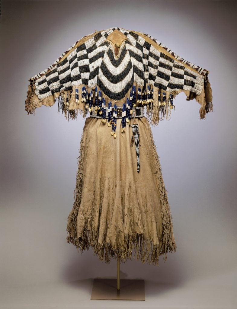 Unrecorded Wasco artist, dress and belt with awl case (Wasco, Oregon or Washington State, 1870). Courtesy Metropolitan Museum of Art, promised gift of Charles and Valerie Diker, photo by Dirk Bakker.