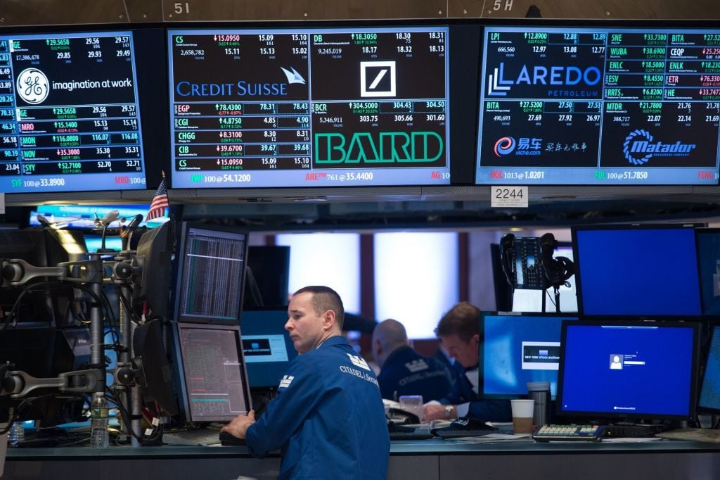 A trader works on the floor of the New York Stock Exchange. Photo: Bryan R. Smith/AFP/Getty Images.