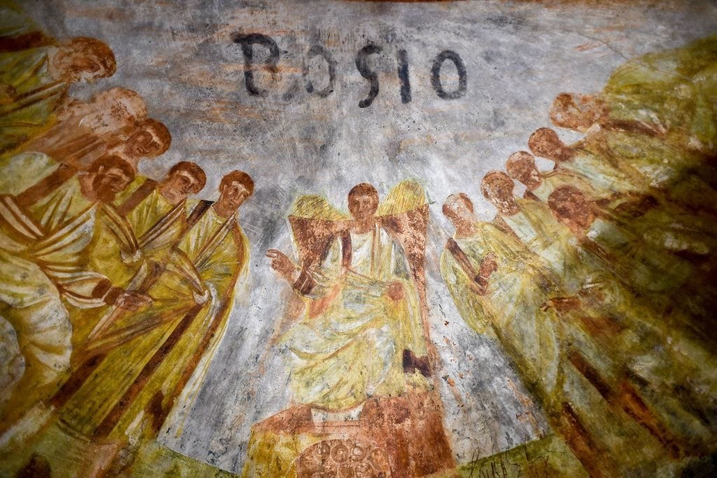 A detail of the restored fresco of "dei Fornai" (bakers) cubicle, is pictured during a visit after the restoration of the catacomb of Santa Domitilla, in central Rome, on May 30, 2017. Photo ANDREAS SOLARO/AFP/Getty Images).