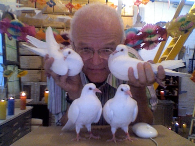 Anton van Dalen with his pigeons. Photo courtesy of the artists.