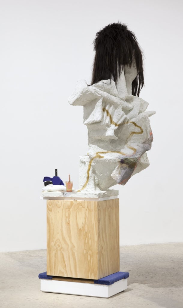 Rachel Harisson, Greatest Hits, 2017, wood, polystyrene, cardboard, burlap, cement, acrylic, synthetic hair, dolly, engineered quartz, trigger clamp, Museum with Walls catalogue, sketchbooks, plastic cup, paintbrushes, and lead shot. Image courtesy of Greene Naftali, New York.