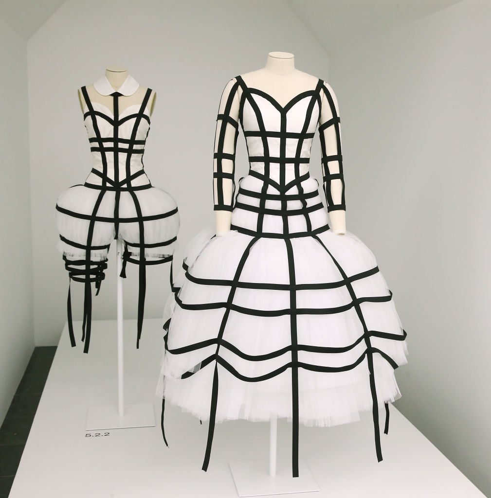Designs by Rei Kawakubo on display at the "Rei Kawakubo/Comme des Garcons: Art Of The In-Between" Costume Institute Gala Press Preview at Metropolitan Museum of Art on May 1, 2017 in New York City. Photo by Jemal Countess/Getty Images.
