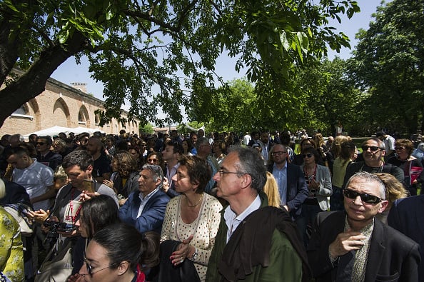 Visitors attend at the opening of the Italian Pavilion. Photo by Awakening/Getty Images.