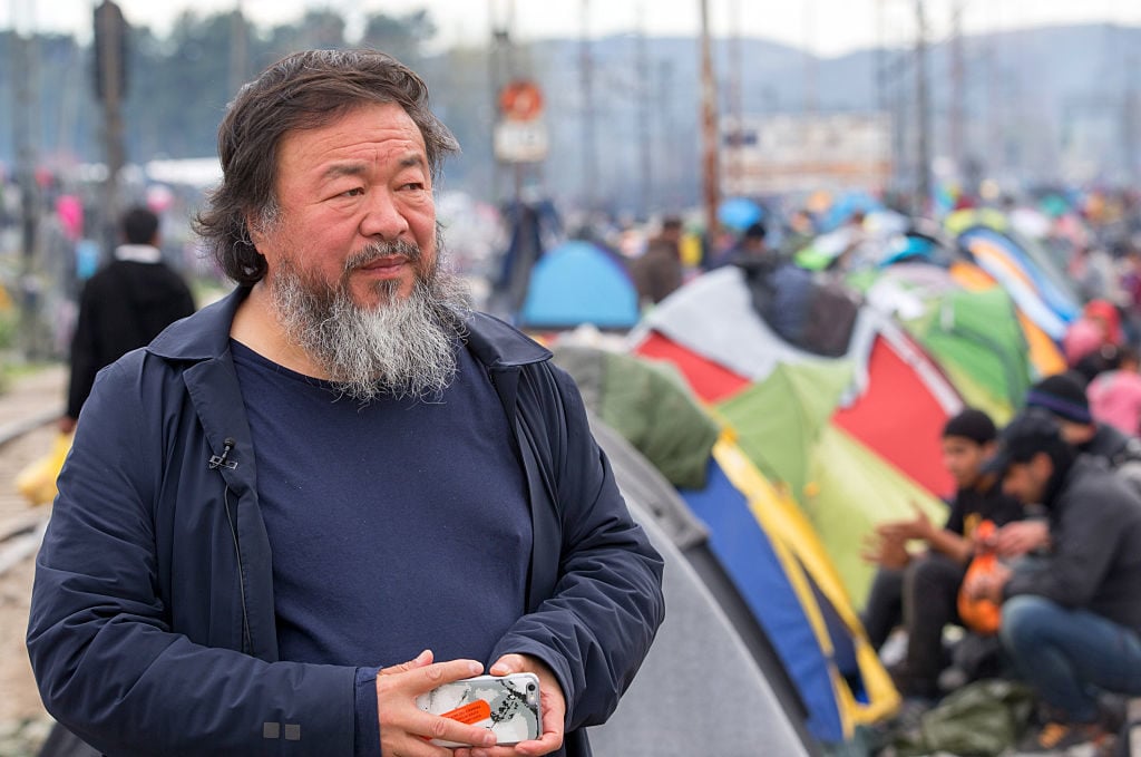 Chinese activist and artist Ai Weiwei at the Idomeni refugee camp on the Greek Macedonia border on March 11, 2016 in Idomeni, Greece. Photo by Matt Cardy/Getty Images.