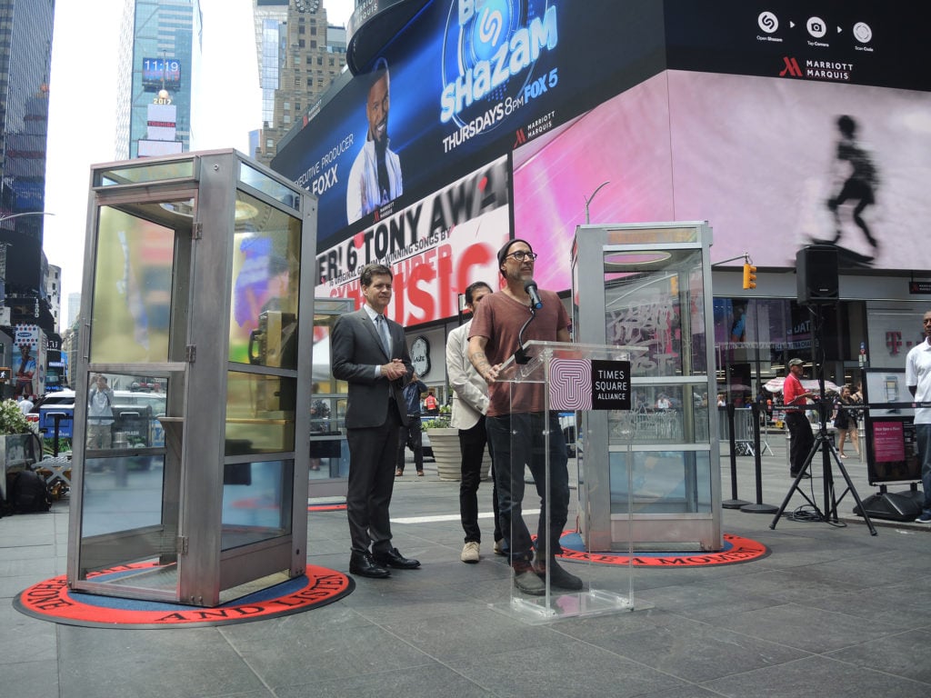 Democratic state senator Brad Hoylman, Times Square Alliance president Tim Tompkins, and artist Aman Mojadidi at his installation <em>Once Upon a Place</em> in New York's Times Square. Courtesy of Sarah Cascone. 
