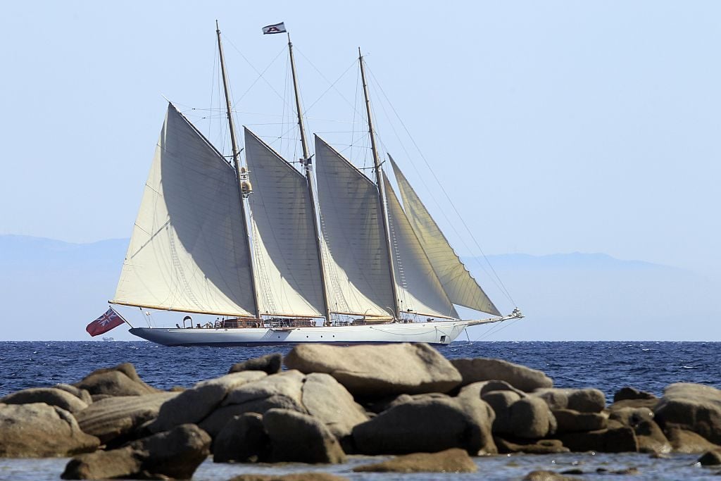 The yacht Adix, owned by Spanish Santander banking group and flying a British flag, sails off Testa beach on August 4, 2015, in Pianottoli Caldarello, Corsica, four days after French customs seized a Picasso on board considered a national treasure by Spain. Photo PASCAL POCHARD CASABIANCA/AFP/Getty Images.
