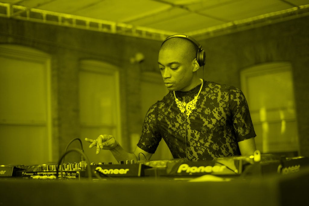 Lotic performing at MoMA PS1's Warm Up event. Image courtesy of MoMA PS1, photo by Charles Roussel. 