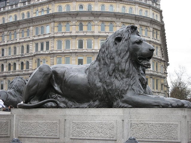 Lion at the base of Nelson's Column by Sir Edwin Landseer (1802-1873) (sculptor), Trafalgar Square, London, UK. Courtesy of Joaquin Martinez via Flickr