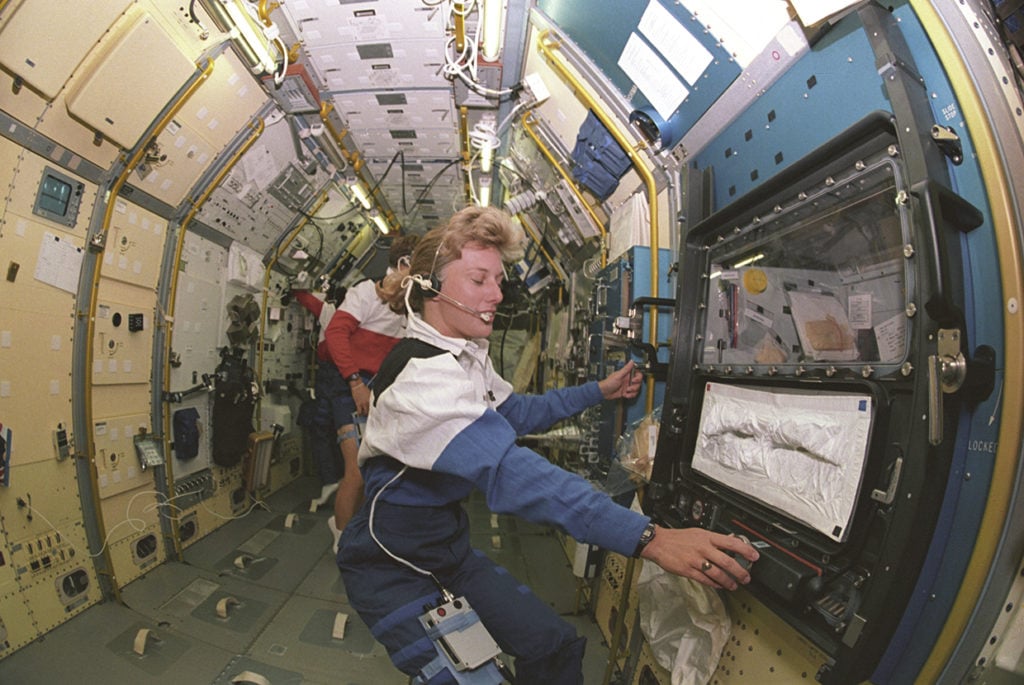 Astronaut Jan Davis working inside Spacelab J module in Space Shuttle <i>Endeavour</i> during STS47 in 1992. Courtesy of National Aeronautics and Space Administration (NASA).