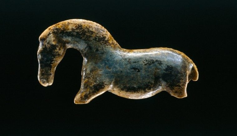 A "Wild Horse" figurine found in Vogelherd Cave in Germany's Swabian Jura region, among the oldest carvings made by humans. Courtesy of the Museum Schloss Hohentübingen, Tübingen, Germany.
