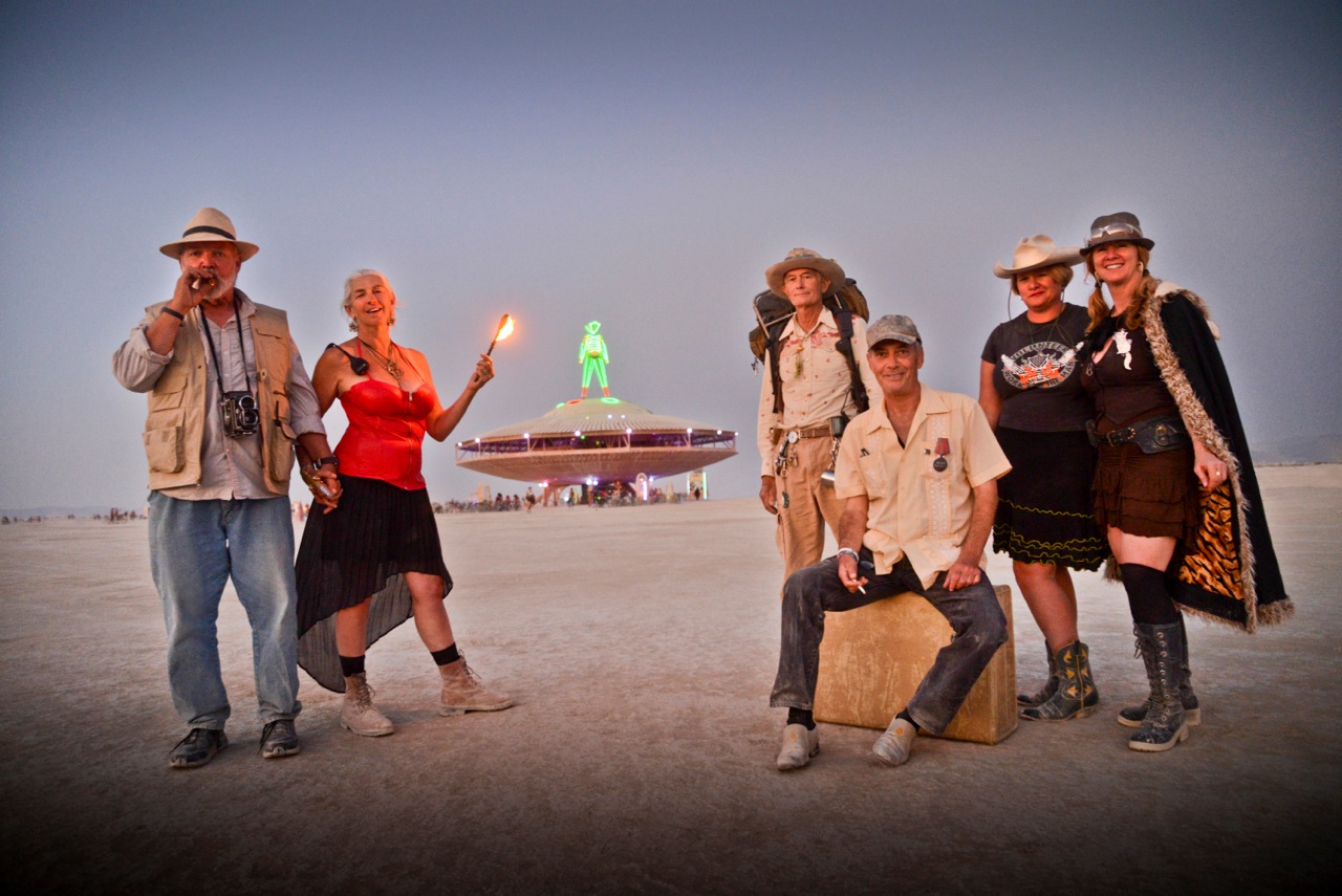 Photograph taken by Karen Kuehn of Black Rock City LLC Founders, Will Roger Peterson, Crimson Rose, Michael Mikel, Larry Harvey, Harley K. Dubois, and Marian Goodell, 2013 Image courtesy of Burning Man Project